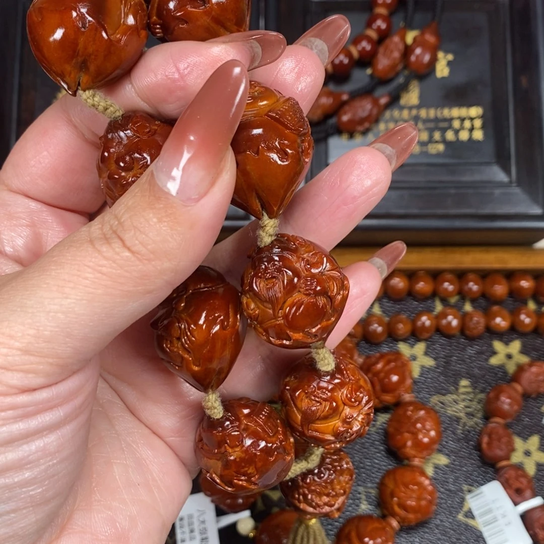 浵***子橄榄核吊坠原皮包衣财迷11