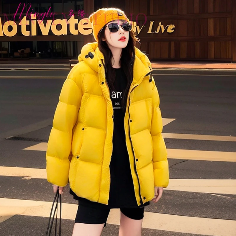2025年冬季明媚感黄色连帽羽绒服韩版宽松保暖休闲风时尚羽绒服女