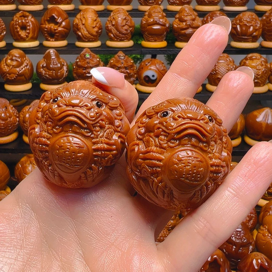 黄***辉橄榄核手串/手链貔貅一对3.9