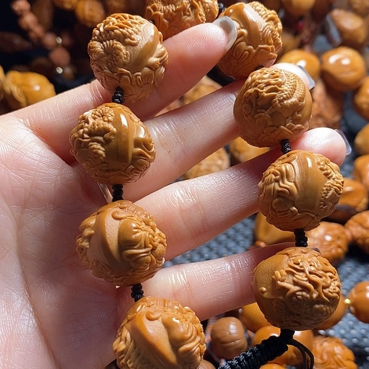 吊坠橄榄核天**勤浮雕龙财神