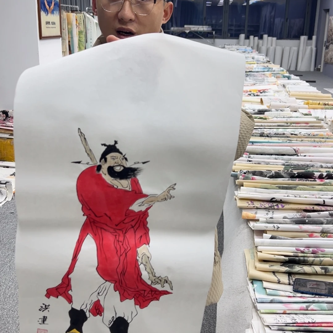 国画卖字画的小男孩