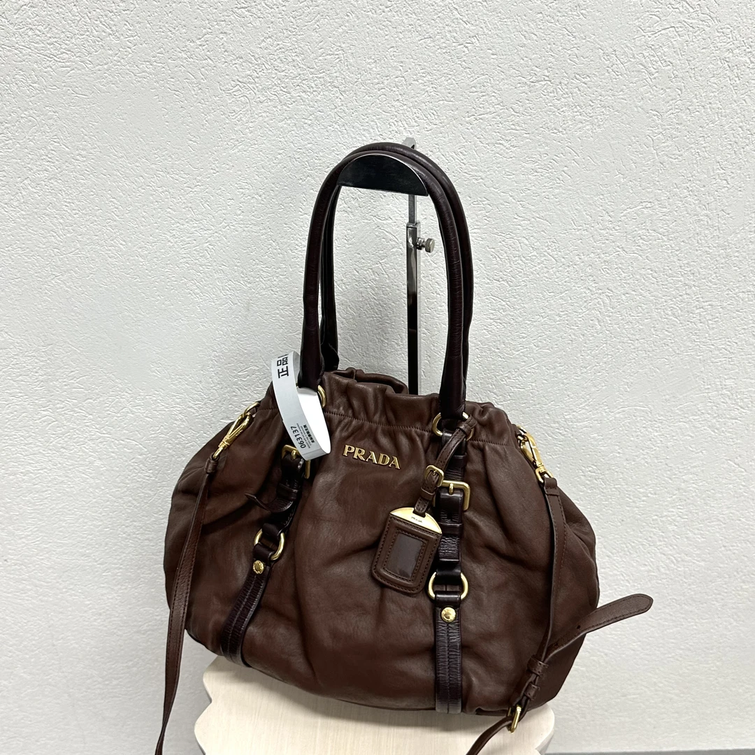 95新 Prada/普拉达 棕色牛皮元宝托特单肩斜挎包 118788