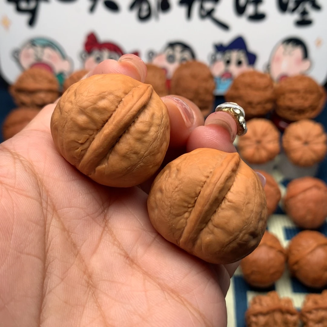文玩核桃把件宇****心海豚