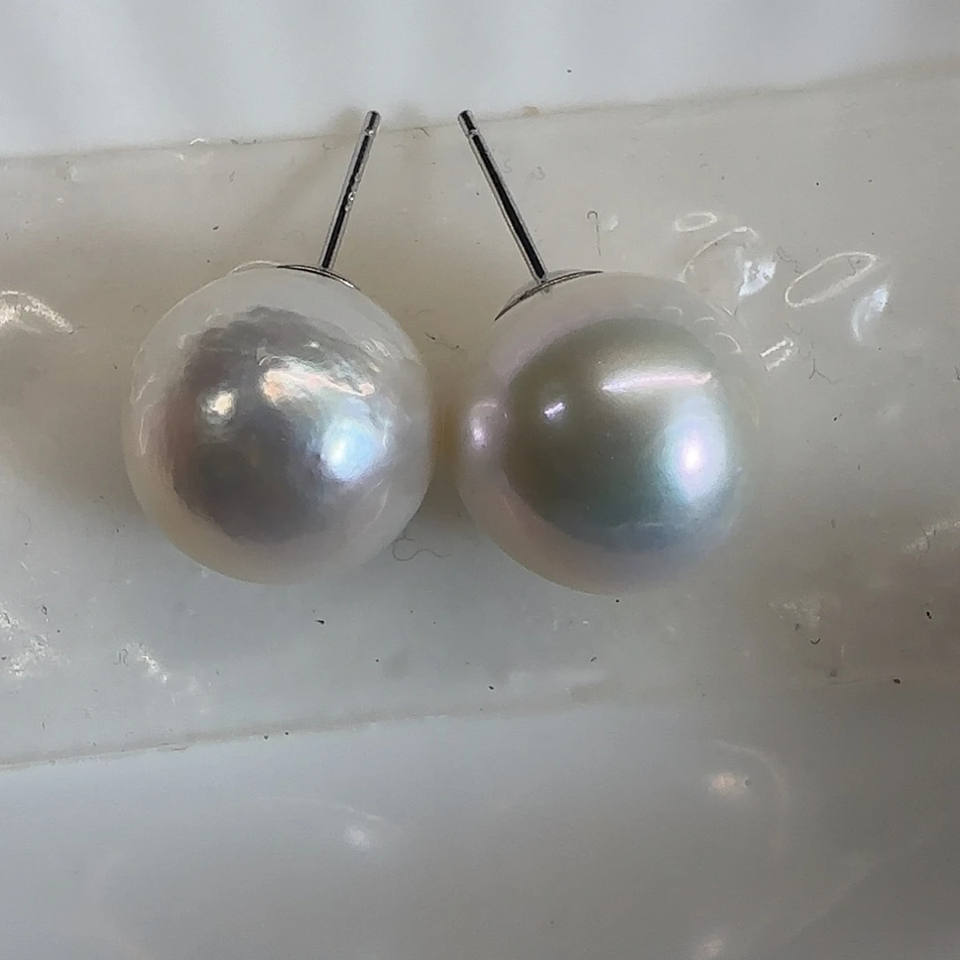淡水珍珠耳饰银S925镶嵌昭****房
