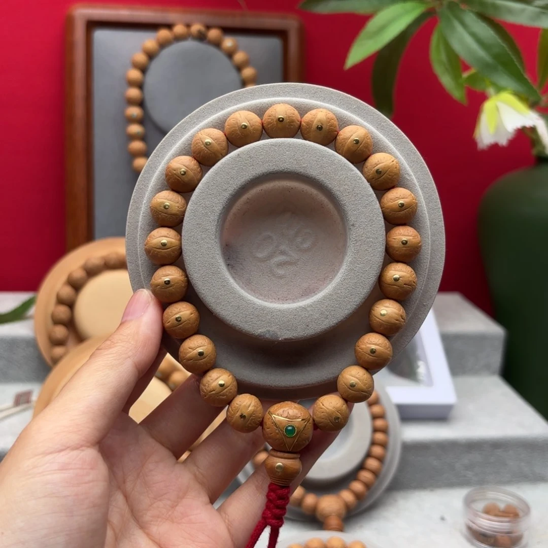 凤眼菩提手串12左右铜钉镶嵌手串