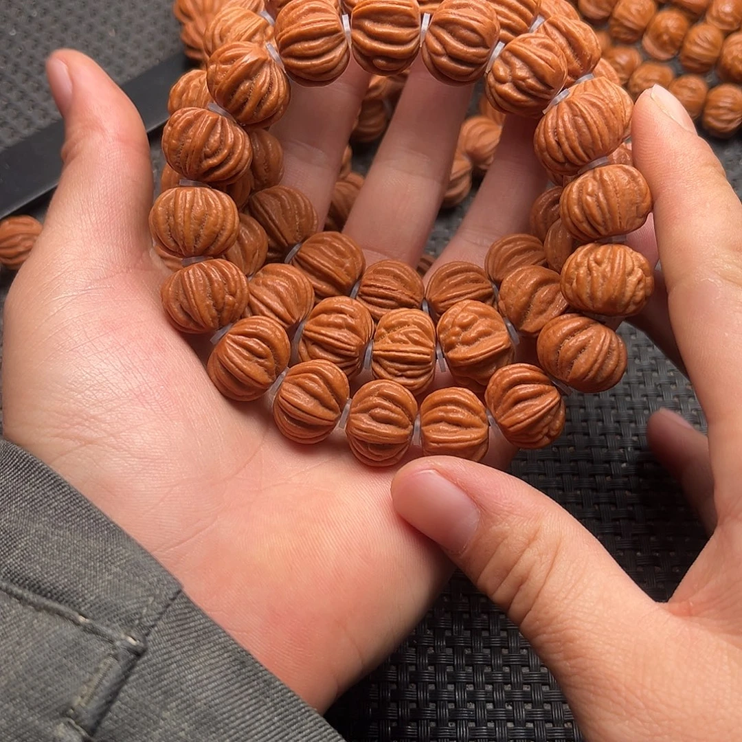 桃核吊坠八道金愁穿