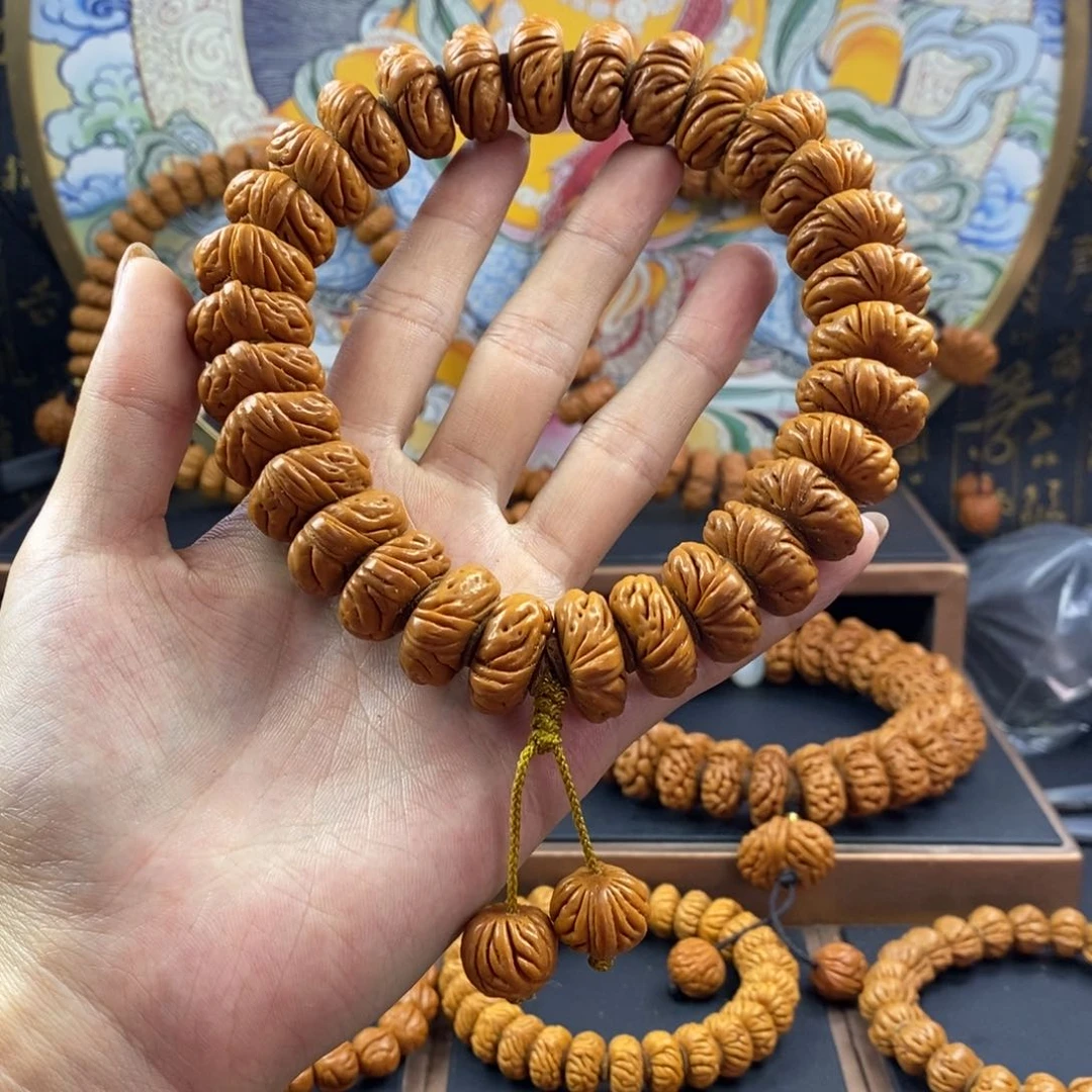 桃核手串阳**业龙纹桃核大肠