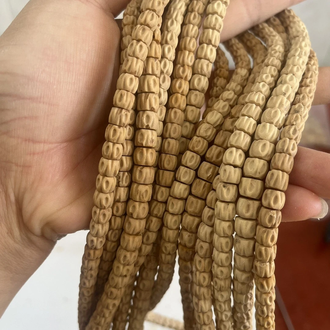 热振藏式百香籽手串原皮直切顺纹鬼脸柏香籽脖挂