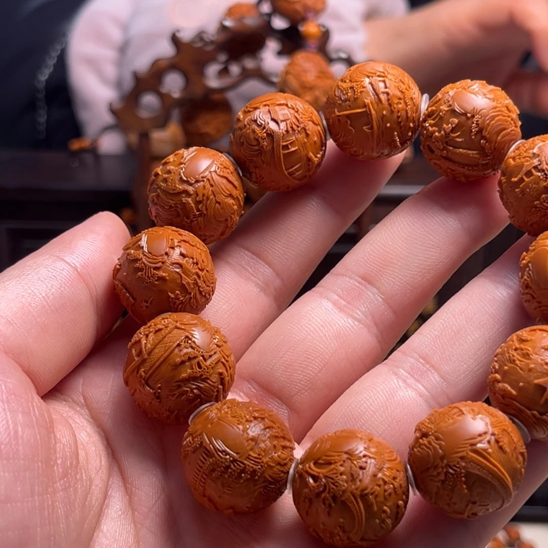 橄榄核吊坠浪**啷景秀山河