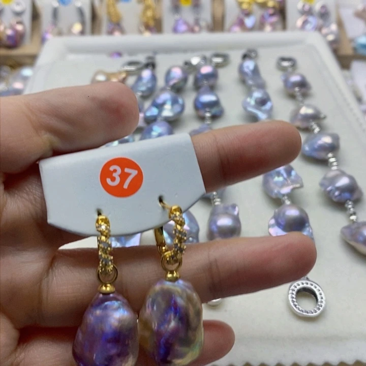 银S925镶嵌耳饰淡水珍珠游**梦