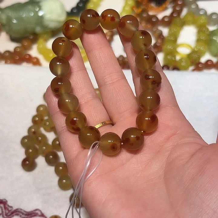 桃***夭蛇纹石玉未镶嵌手串