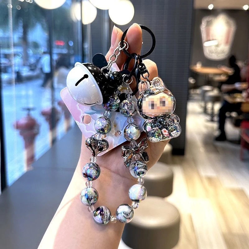 爆款创意精致卡通手机链可爱精美入油拉拉串珠书包情侣挂饰