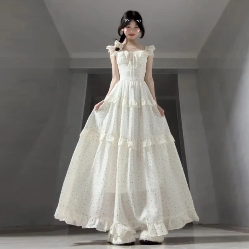 法式小飞袖白色波点吊带连衣裙子女夏季2025新款海边度假气质长裙