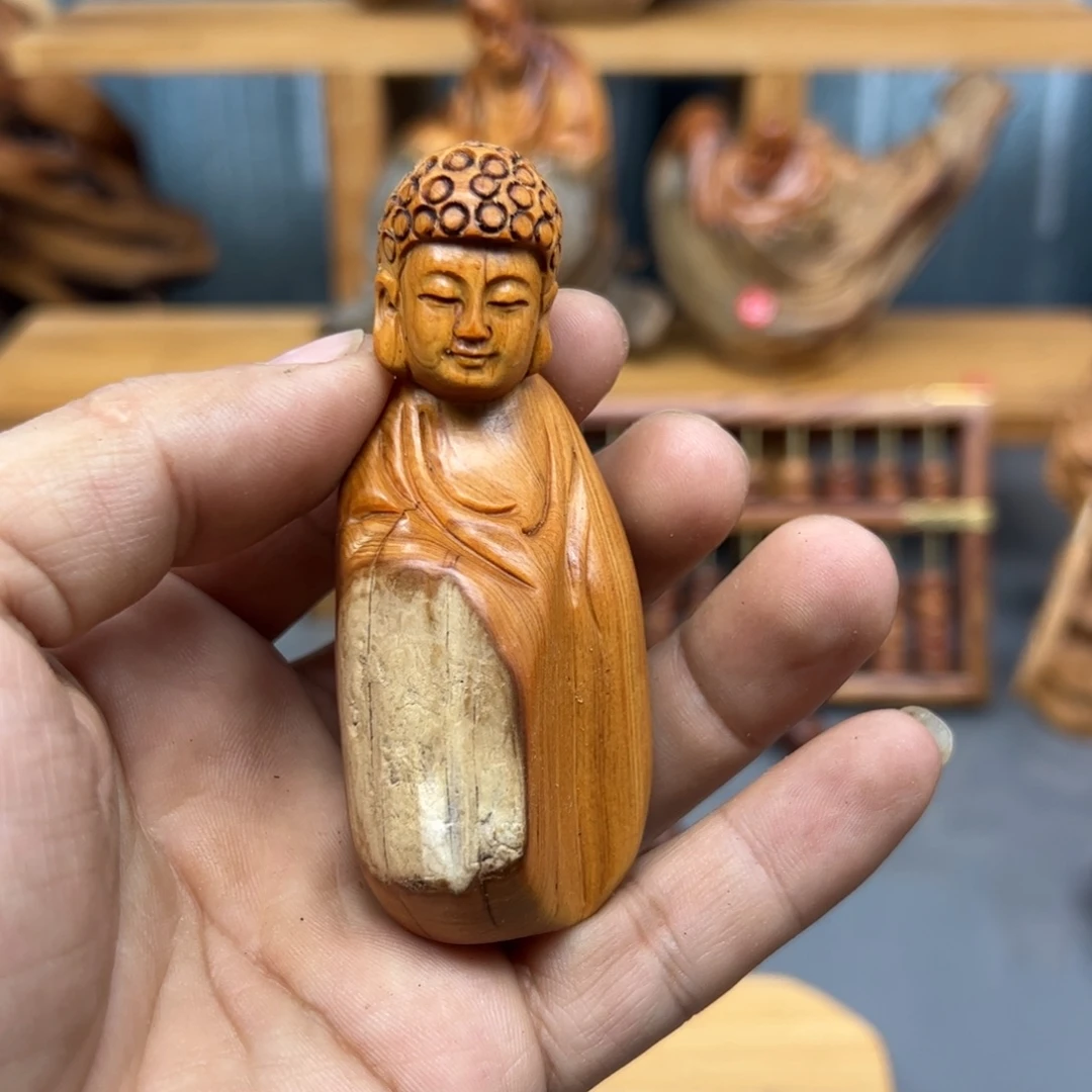扎***觉木崖柏木摆件手把件