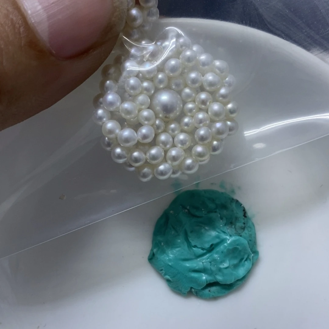 苏***记合金淡水珍珠耳钉