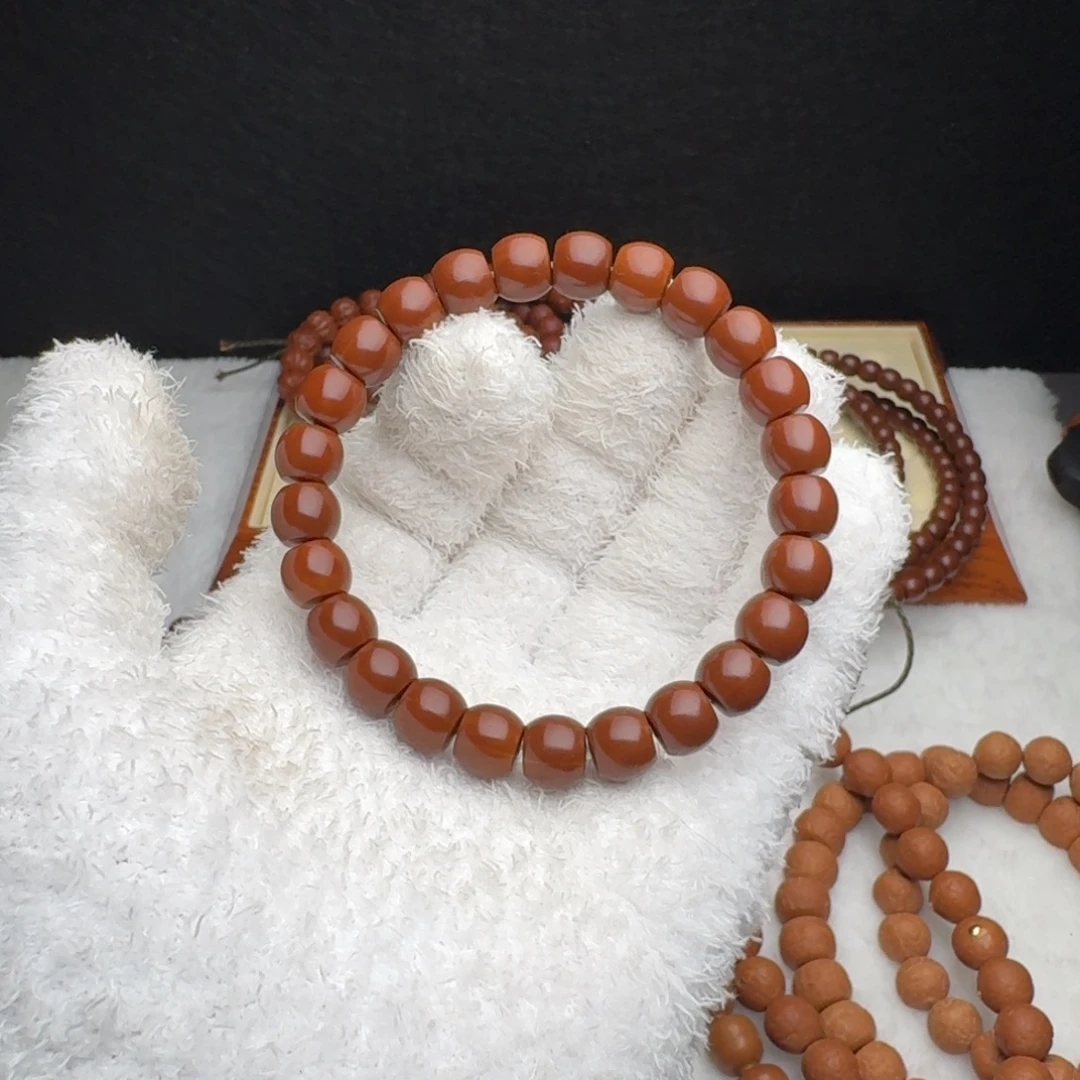 浩***崽文玩核桃手串一级品直切红9