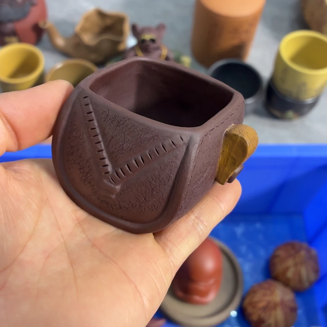 紫砂茶杯放漏放漏放大漏了