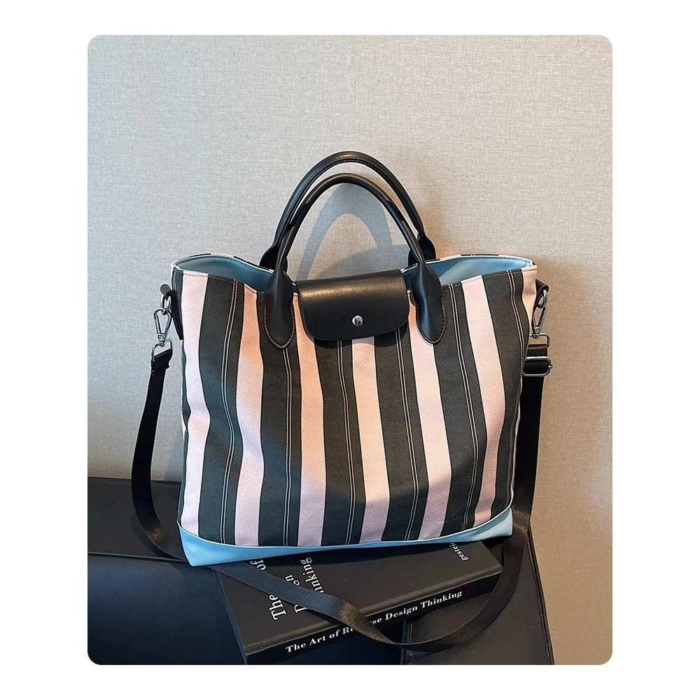 大容量手提时尚旅行包女士短途出差防水收纳行李包轻便运动健身包