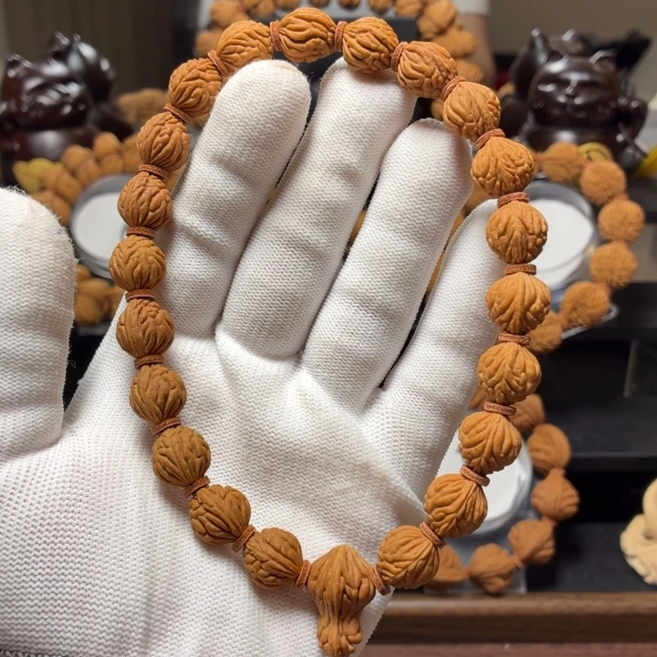 。***。桃核手串小金豆 1.2 手持边肚 1.2