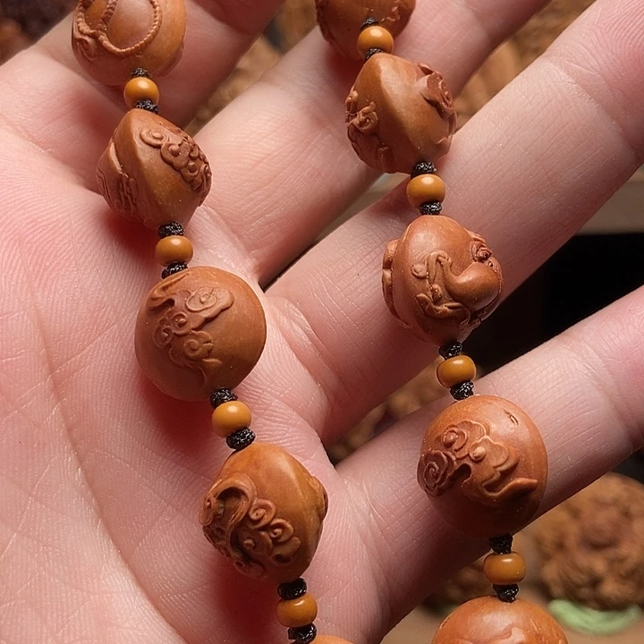 龙纹桃核法器多宝