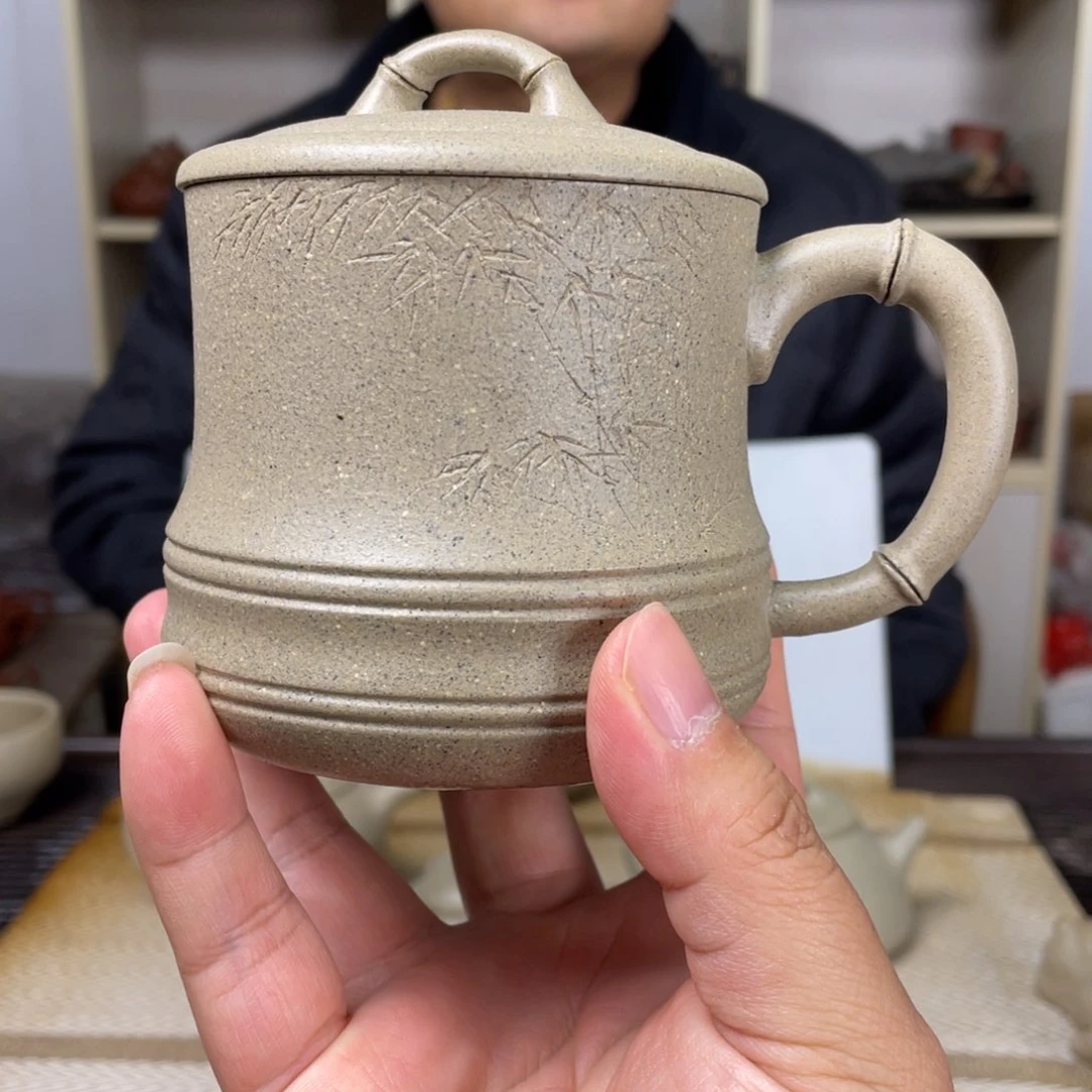 紫砂茶壶以**贵蟹壳青盖杯