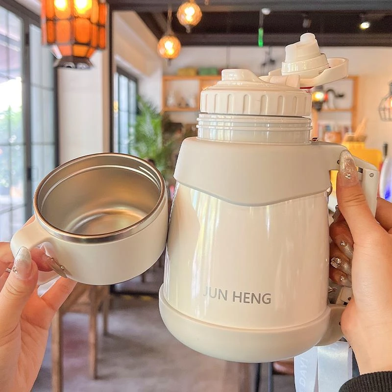 大号容量保温杯女生2025新款高颜值带盖子喝水抱婴袋斜挎学生大肚