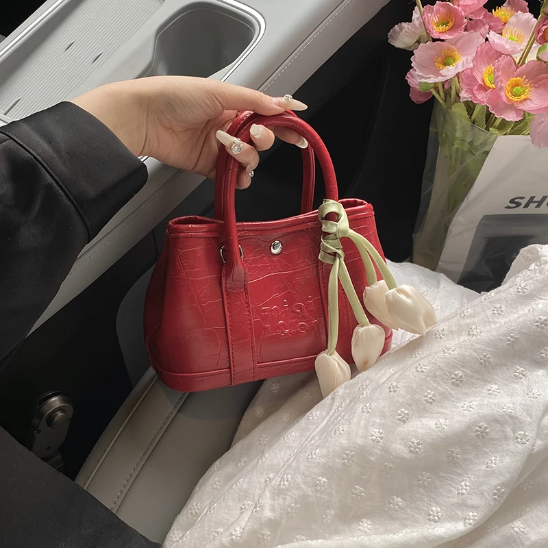 温柔田园风甜美风耐磨手提式斜挎包腋下包艺术流浪风轻奢纹路单肩