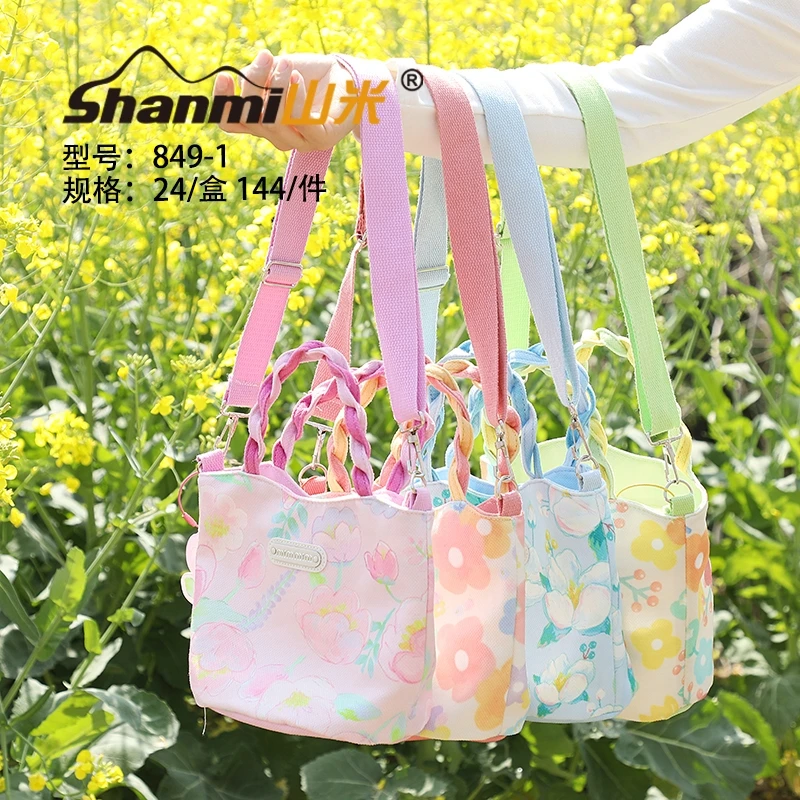 山米849-1原创水桶包麻花编织手柄斜挎包