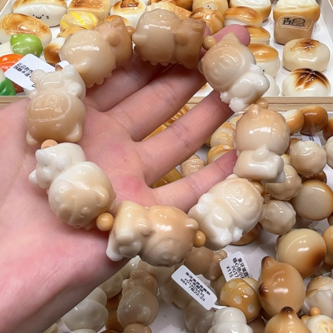 菩提根/象牙果手串7.27.13象牙果恐龙拉布布
