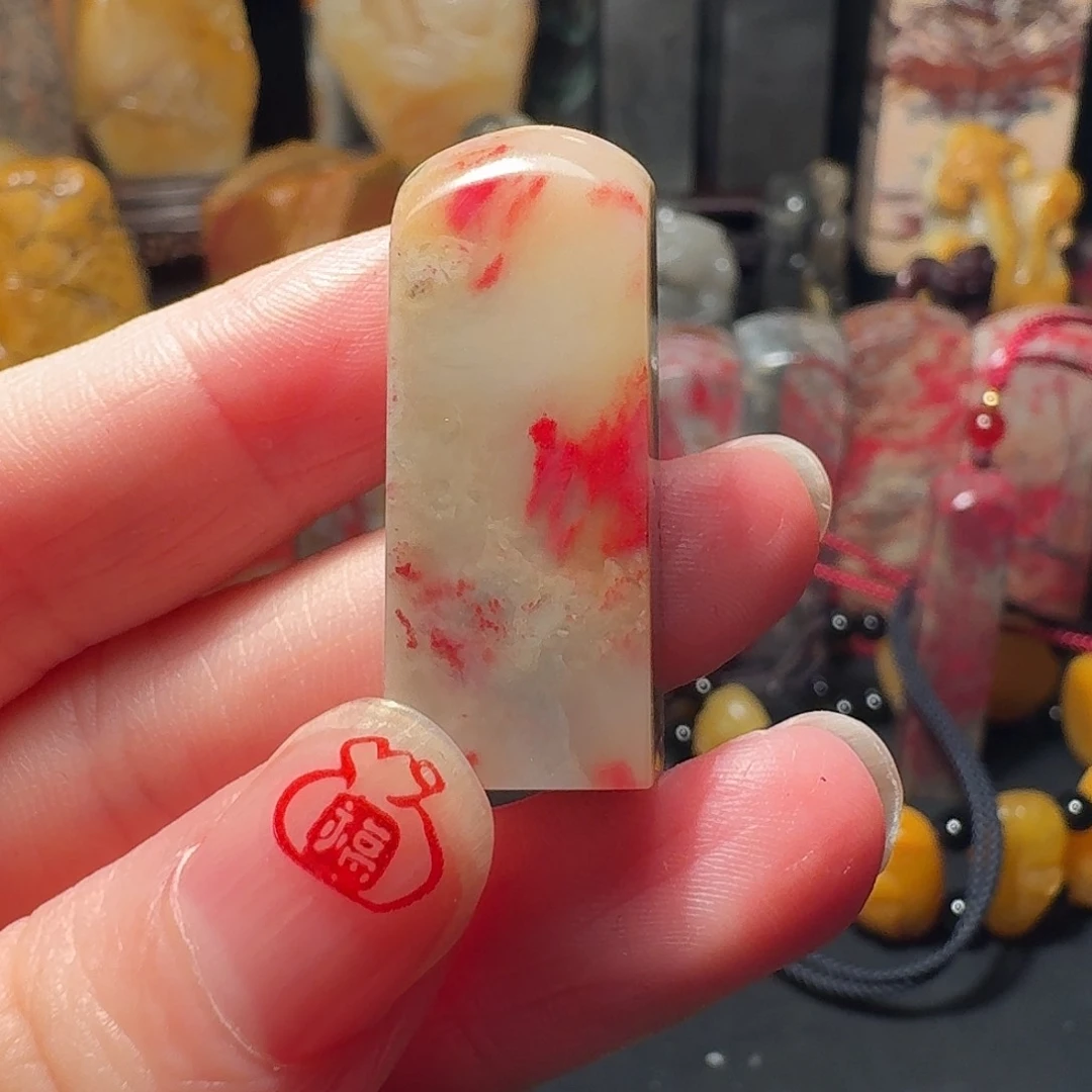 昌化石强**划昌化鸡血石