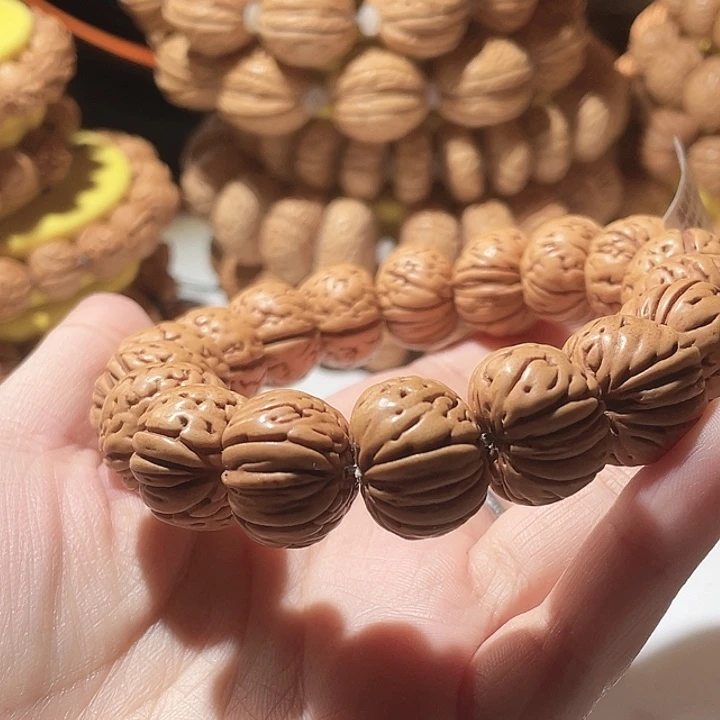 行***疆桃核吊坠桃核手串树王纽扣23