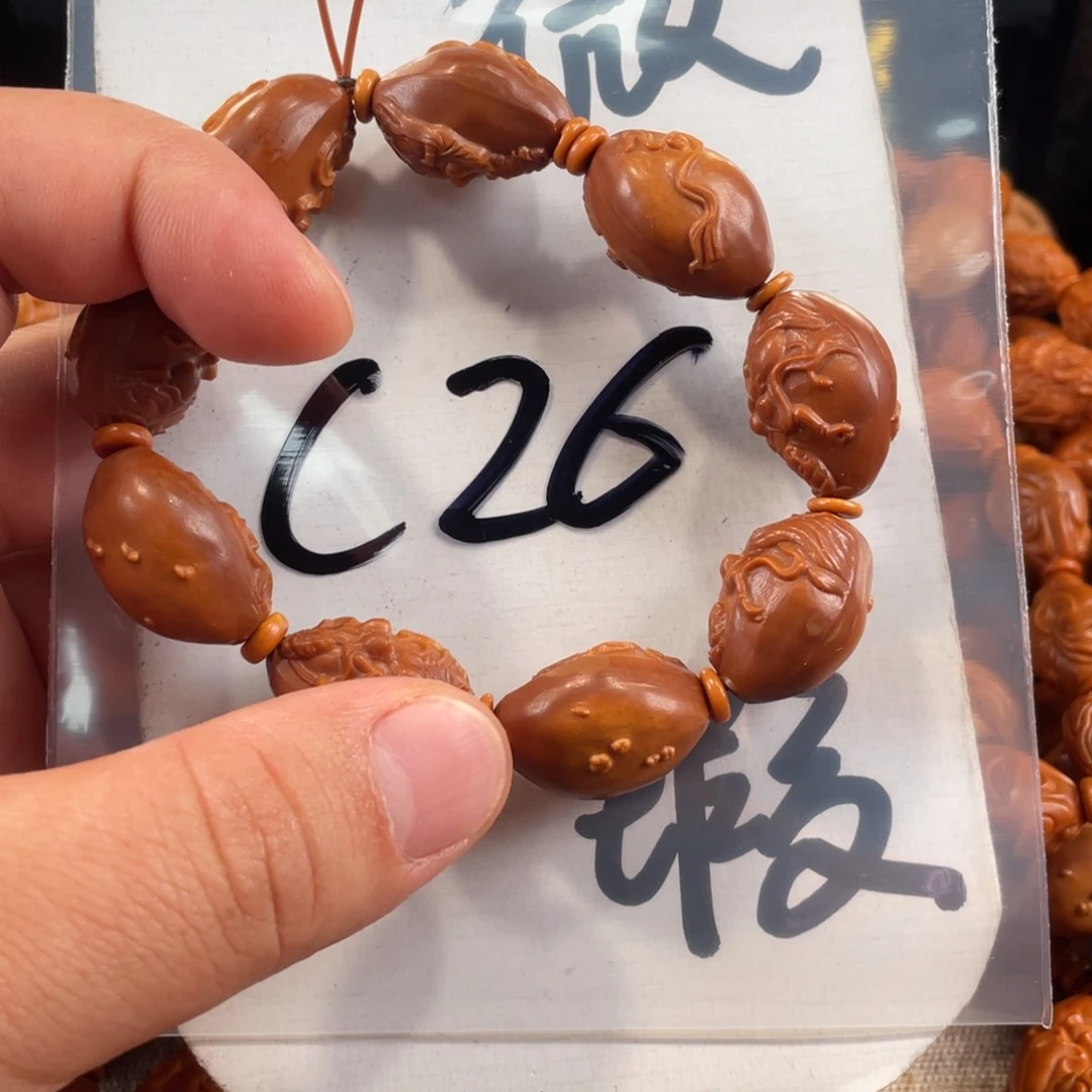 橄榄核其他橄榄核雕工艺手串 瑕疵介意勿拍