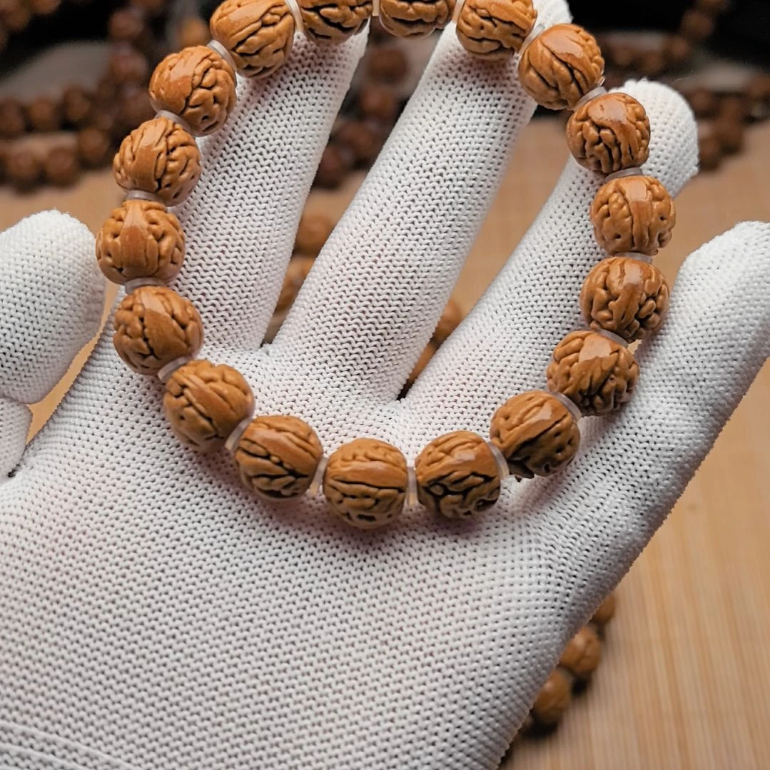 桃核吊坠肉纹大肠手串