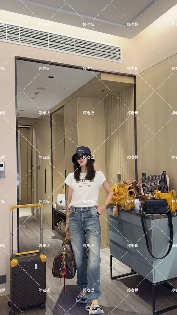 『婷老板』新款、破洞白点蓝色牛仔裤57044