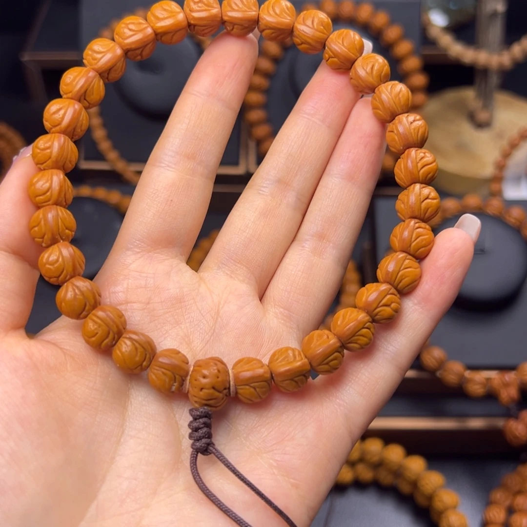 木***木桃核手串野生玉龙脊10