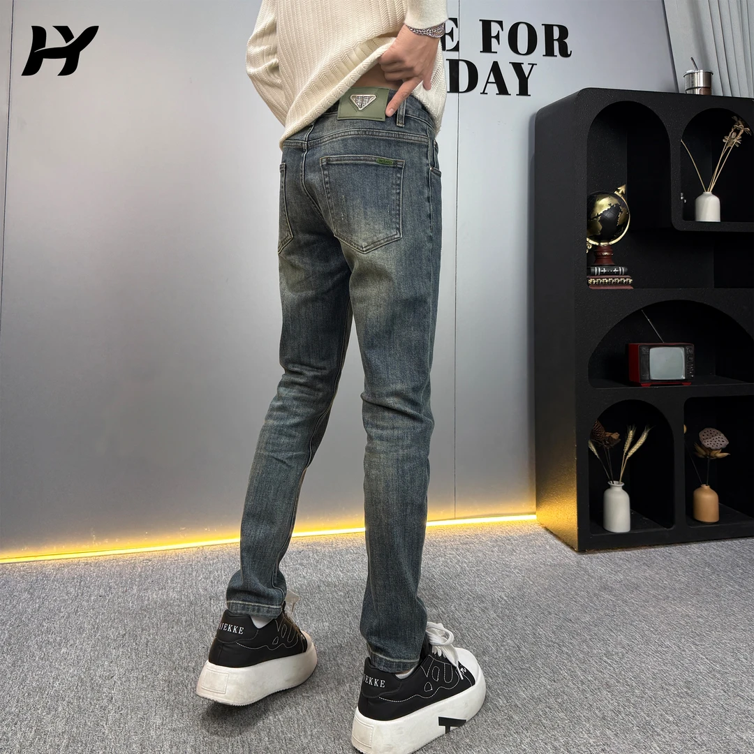 秋季新款简约复古色牛仔裤男士时尚潮流韩版百搭修身小脚长裤子男