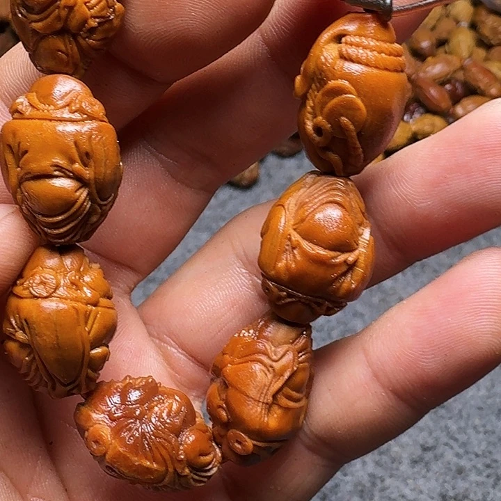 橄榄核手串老*你的手机