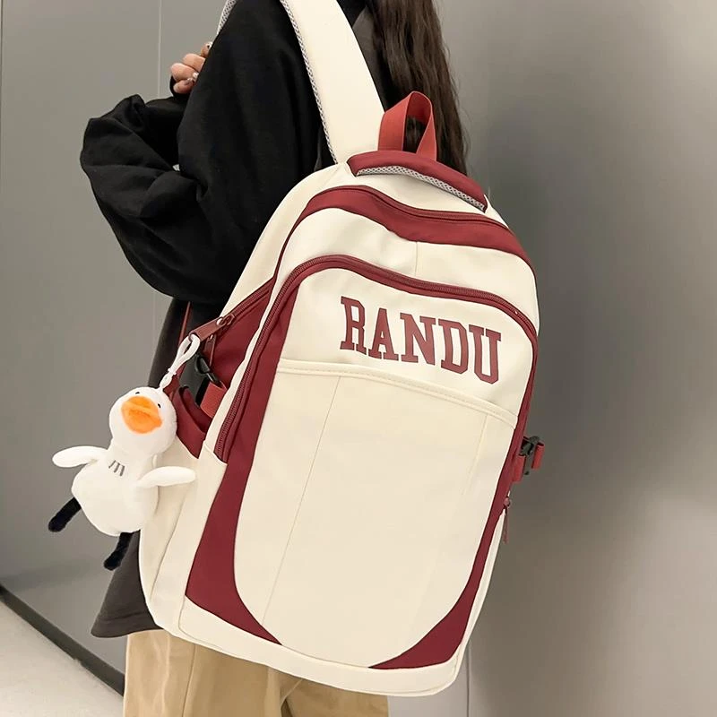 FAVMARTHA书包女生女孩初中学生新款小众大容量双肩包超轻护脊