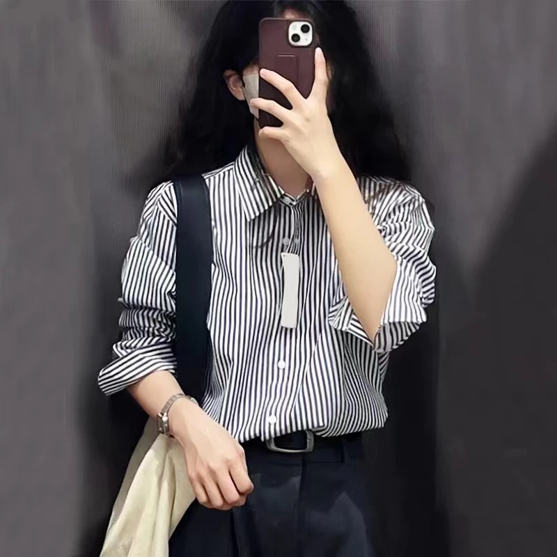 早春宽松条纹衬衫女款外穿显瘦休闲时尚衬衣法式小众设计感上衣
