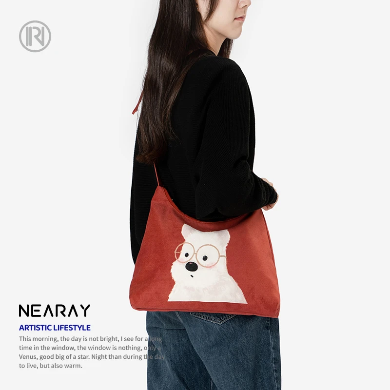 尼睿小众新款简约休闲可爱小狗斜挎帆布包时尚百搭单肩包包女AS