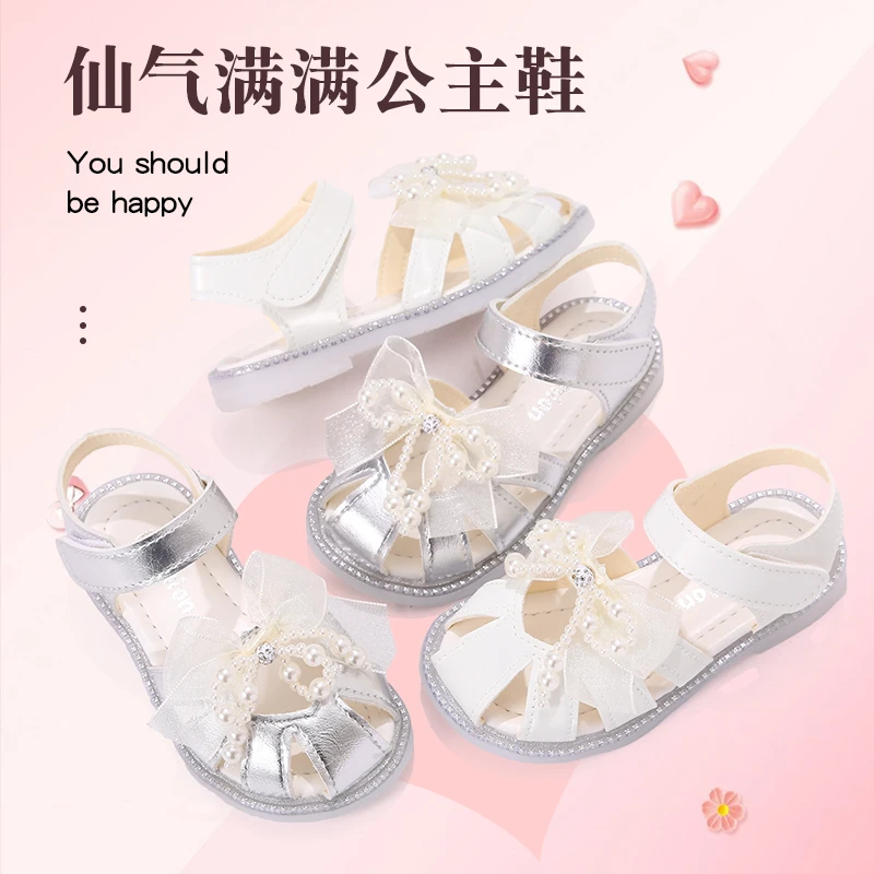 公主风包头凉鞋小女孩软底2025夏季新款镂空沙滩鞋凉鞋百搭蝴蝶结