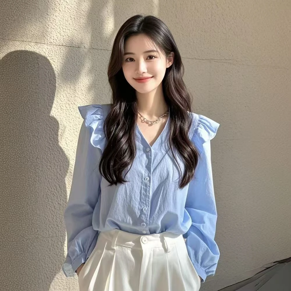 流行漂亮小衫轻奢春季高级法式小众绝美设计蓝色长袖衬衫新款上衣