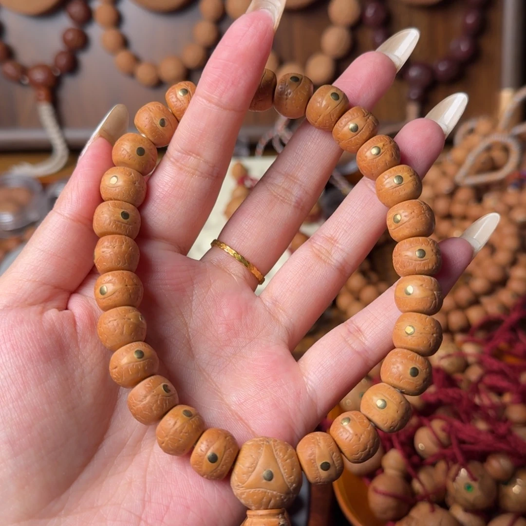 凤眼菩提把件精工藏切/12mm/27颗手持/铜钉