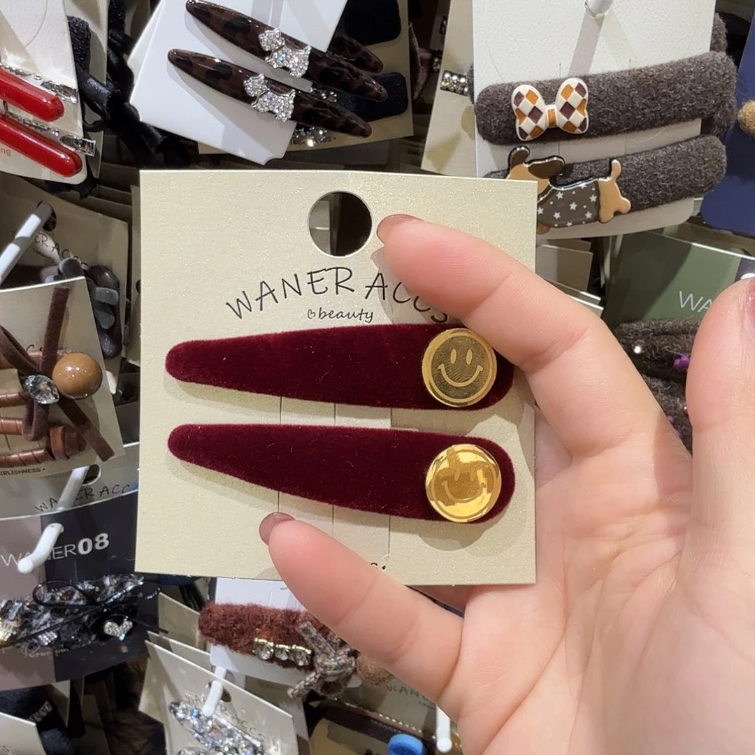布艺非金属红色笑脸拜拜