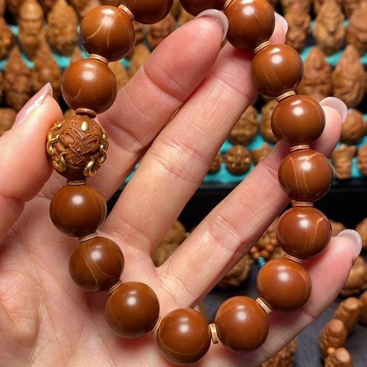 橄榄核手串/手链1.4正圆铁核+象神镶嵌单子