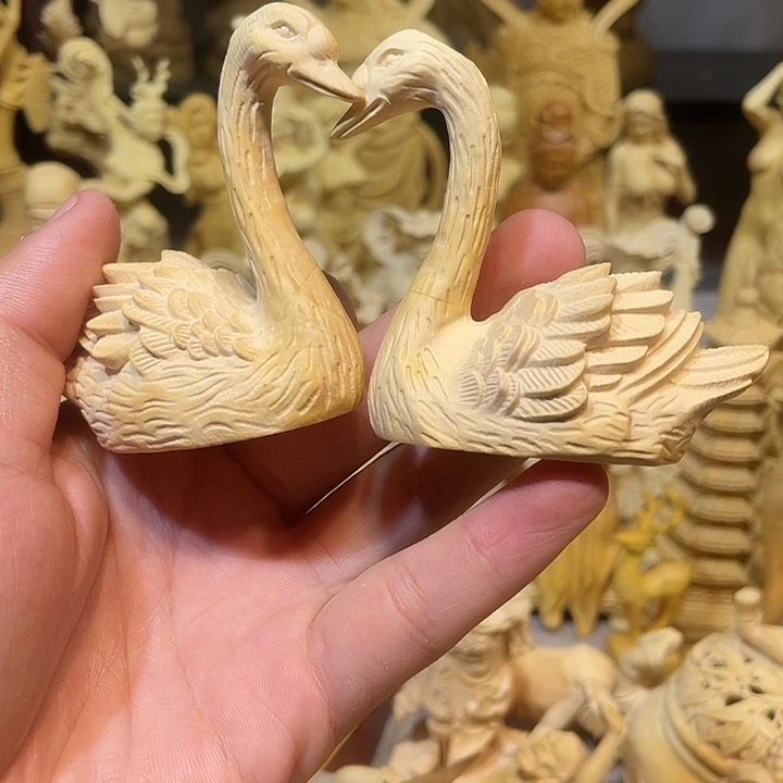 水***金黄杨木瑕疵天鹅一对