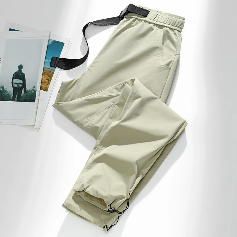 普朗达2025新款男女同款冲锋裤户外登山裤子防风防水宽松情侣裤男