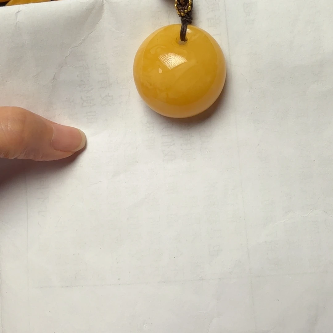 美***酱琥珀未镶嵌颈饰平安扣