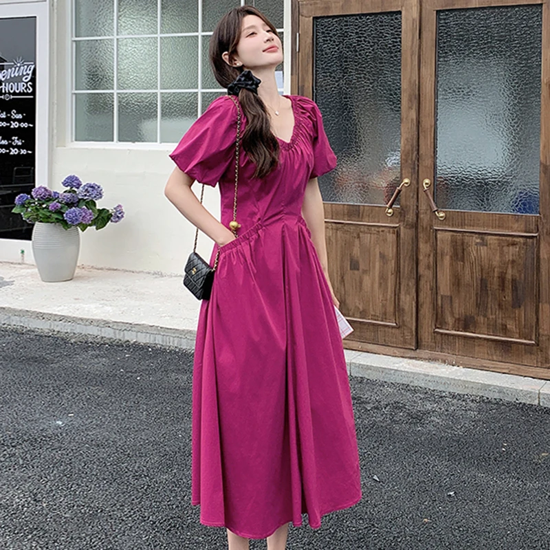 绝美粉色V领泡泡袖连衣裙女夏季设计感气质收腰长裙6947