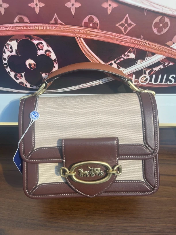 99新 COACH/蔻驰 马车斜挎包